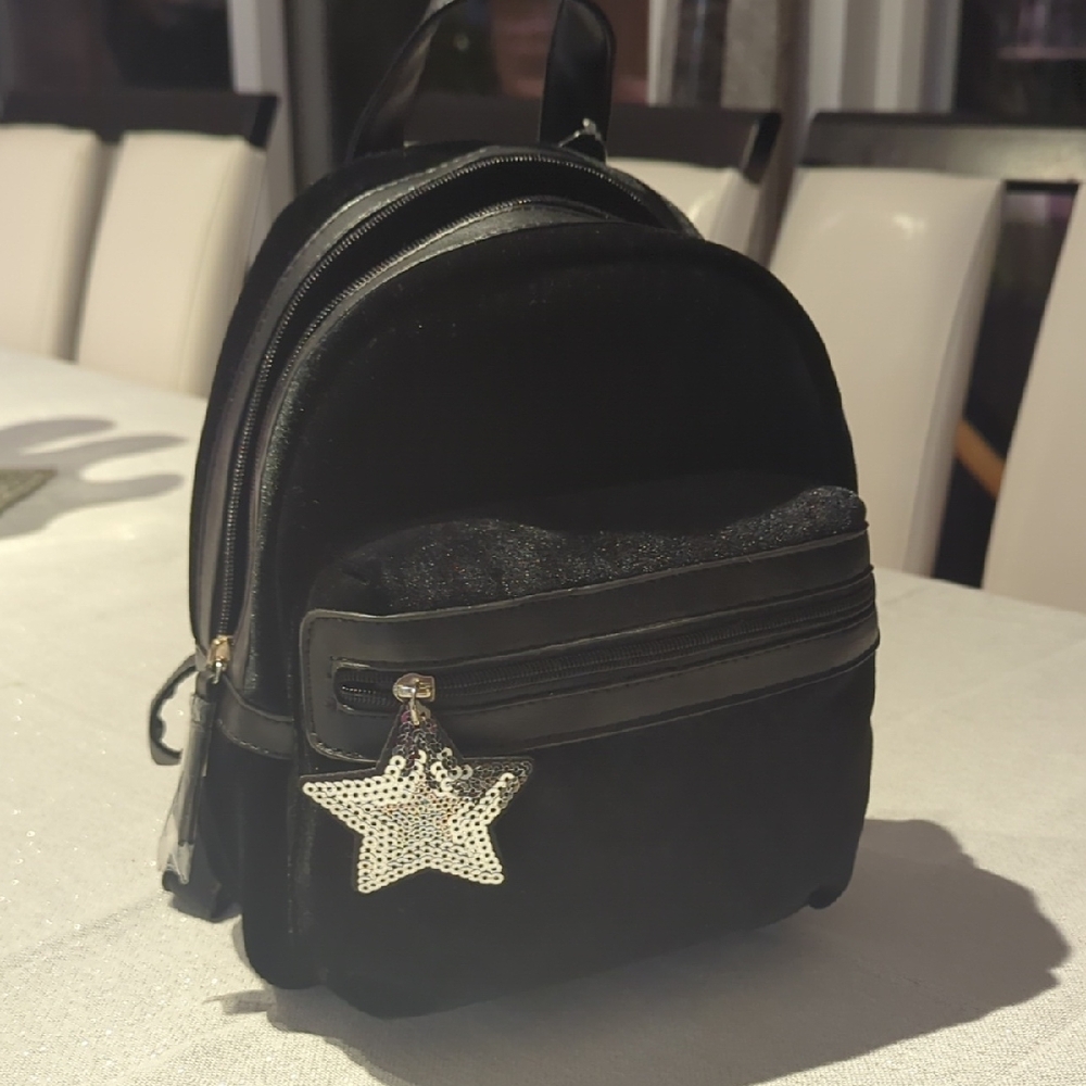 Black Backpack with Star Charm